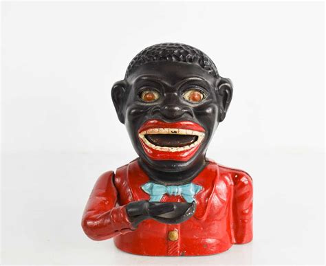 metal negro money box|Vintage 'Greedy Boy' and similar cast money box / money safe.